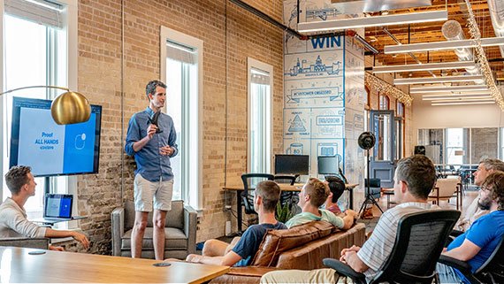 Professionals reviewing a website project presentation